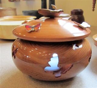 Pierced and decorated butterfly lidded pot by David Reed